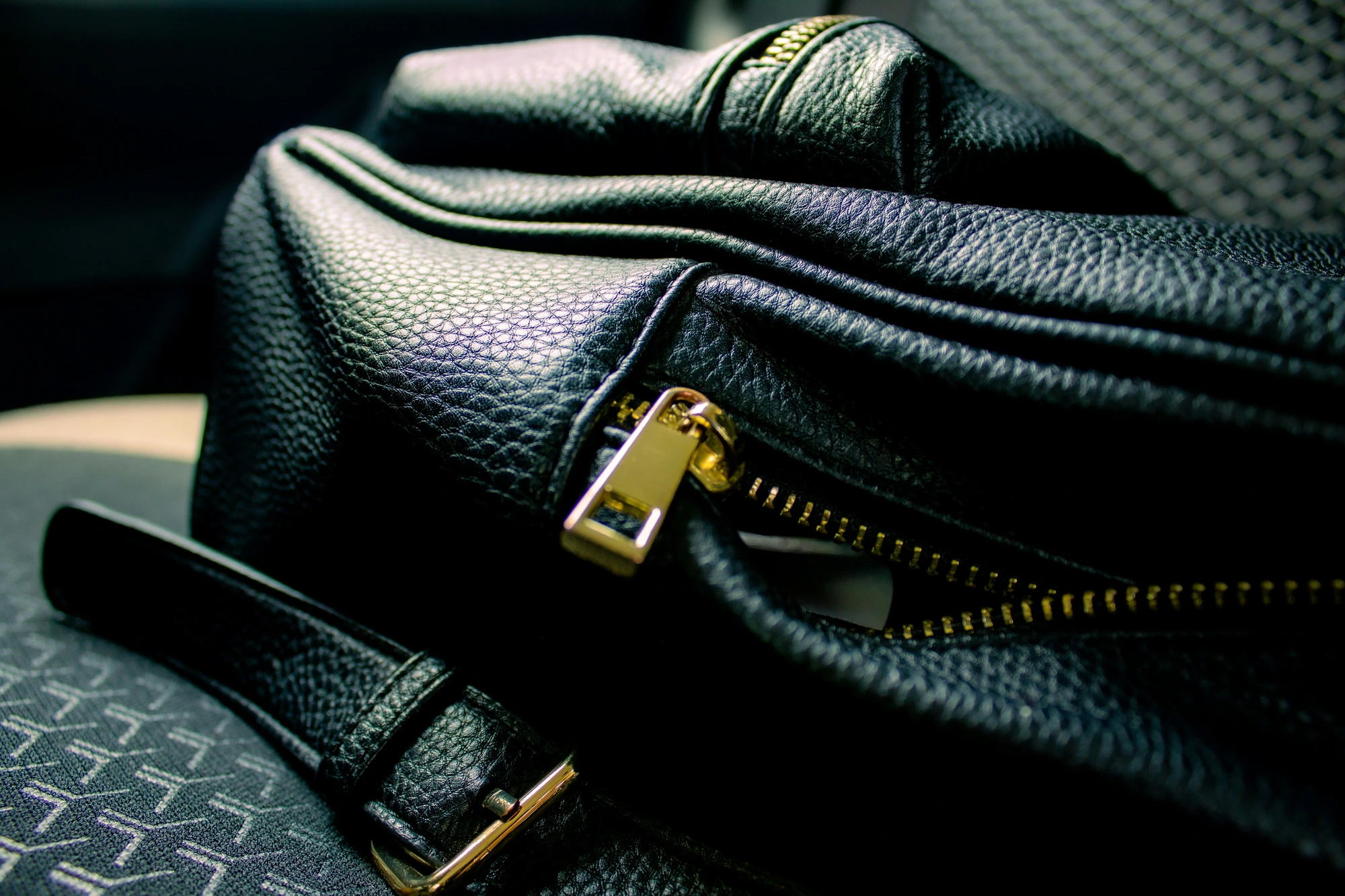 A close-up shot highlighting the fine texture of a leather bag, a key element of Quiet Luxury fashion.